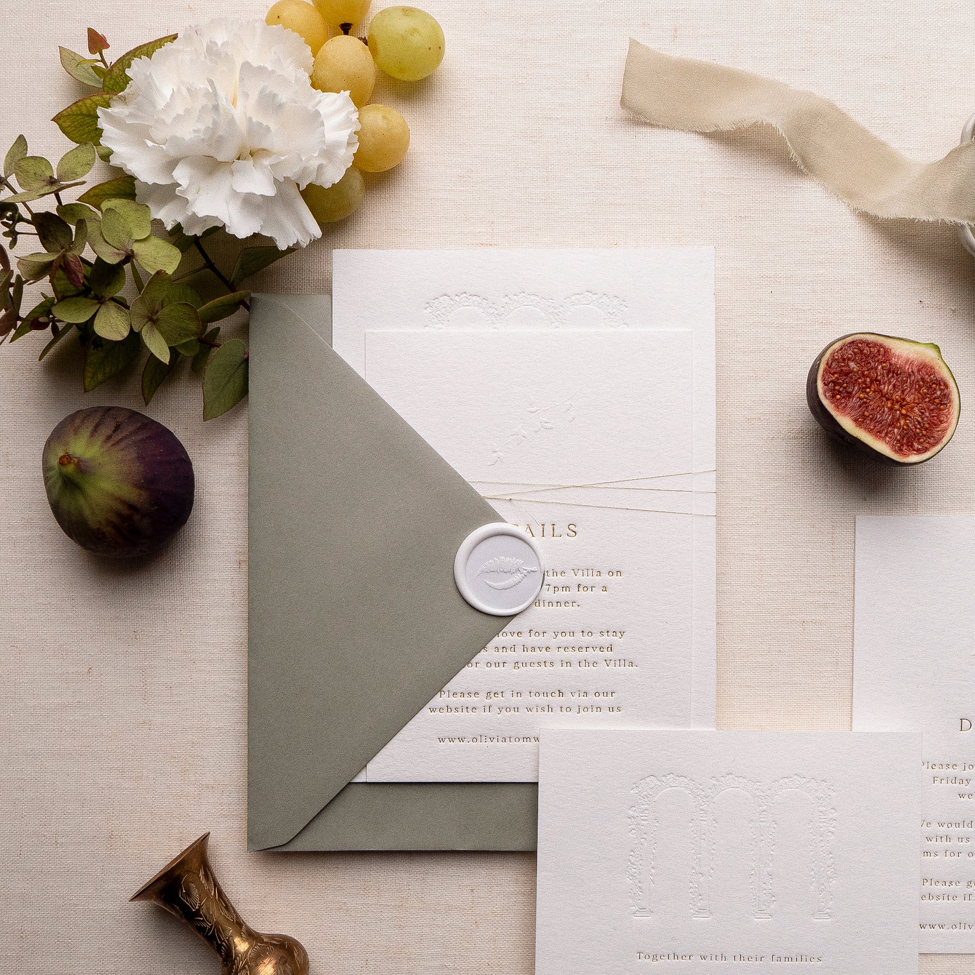 letterpress wedding venue illustration invitation with gold foil text on thick luxe ivory card