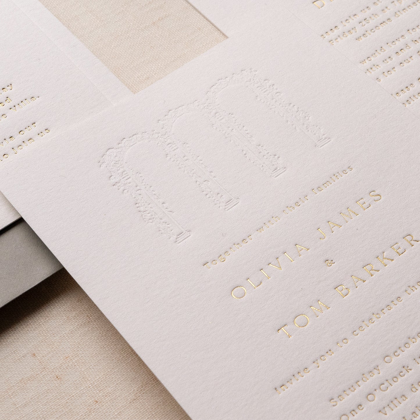 letterpress wedding venue illustration invitation with gold foil text on thick luxe ivory card