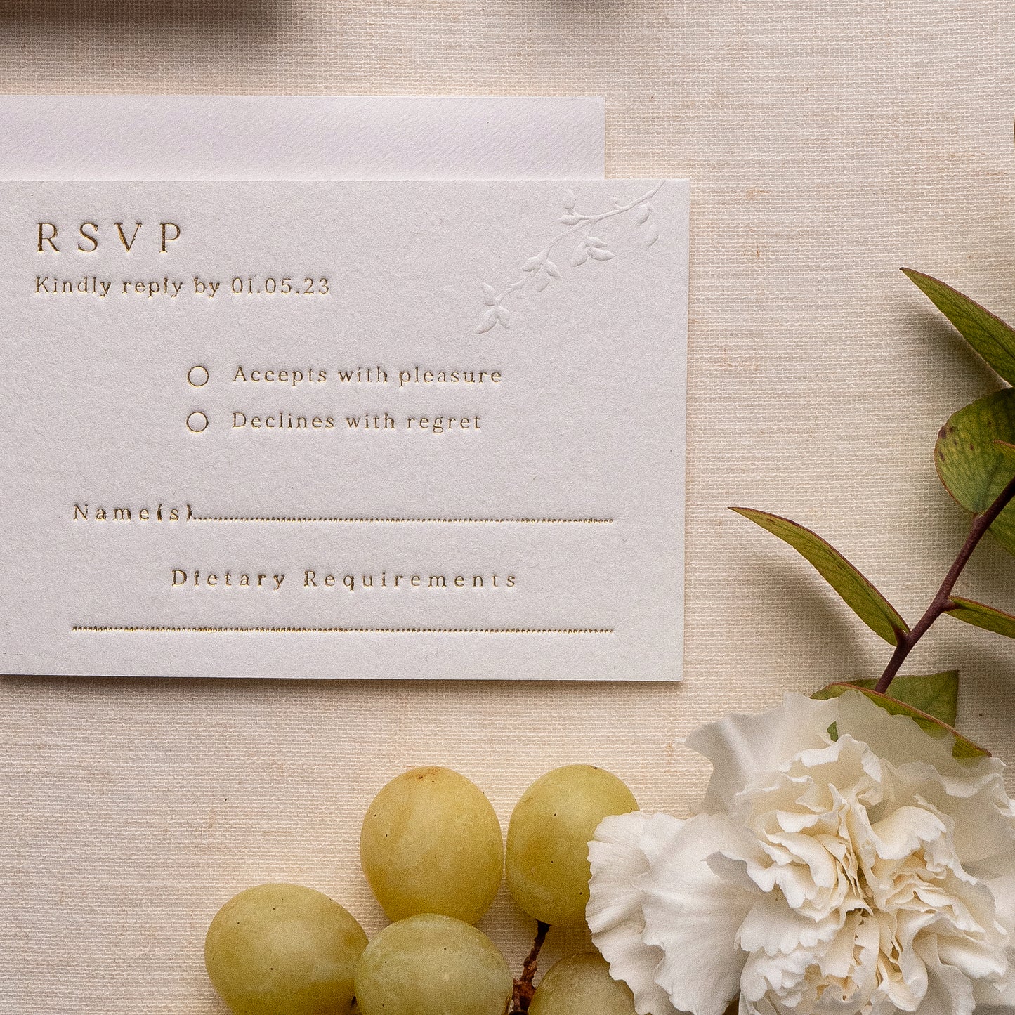 letterpress wedding venue illustration invitation with gold foil text on thick luxe ivory card